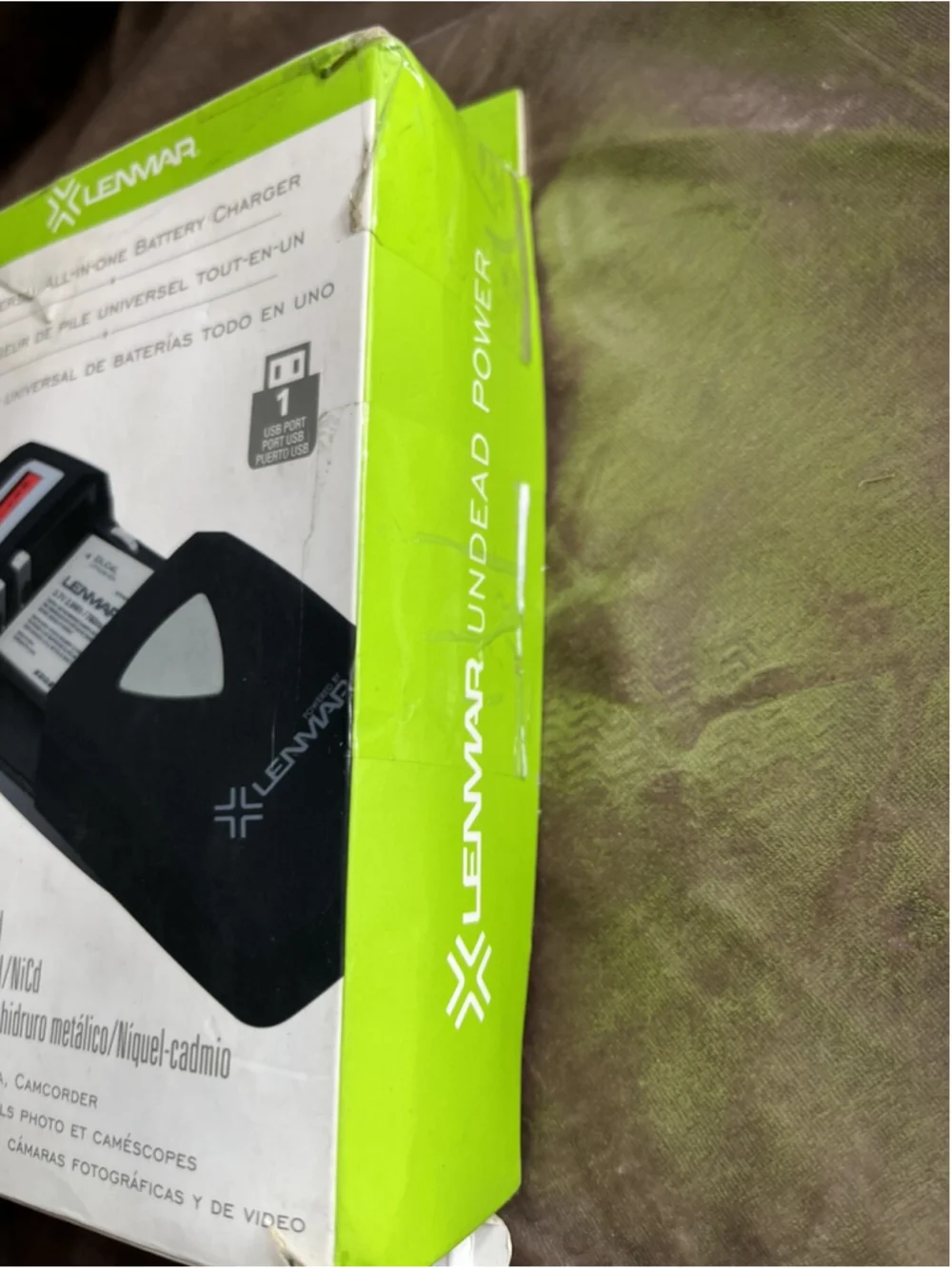 RARE FINE All-in-one battery charger for Mobile Phones, Cameras, and Camcorders
